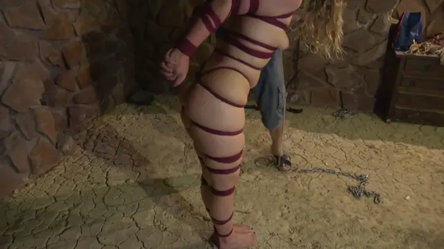 Poster: Teen girl kidnapped, chained and rope hogtied in the dungeon