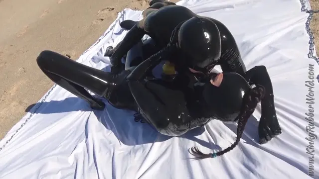 Poster: 7139 Latex Catsuit Fuck on the Beach Poster: 7139 Latex Catsuit Fuck on the Beach