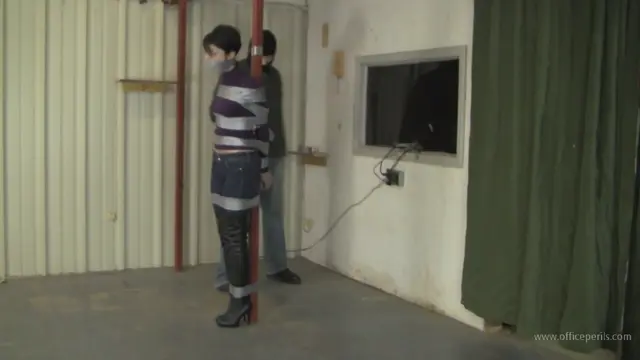 Poster: Tape Tied Booted Babe Poster: Tape Tied Booted Babe